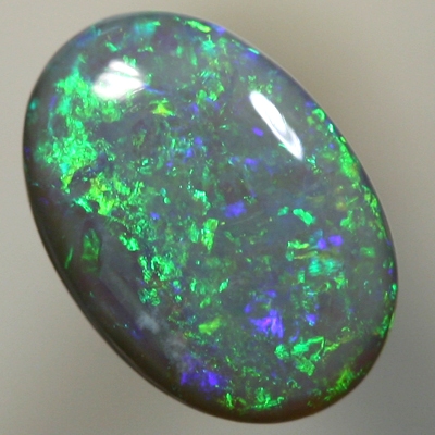 SOLID SEMI BLACK OPAL Sparkles of bright greens over blue
